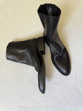 Elevate Your Style with Steve Madden Nexie Slouch Block Heel Boots - Bargain Warriors LLC